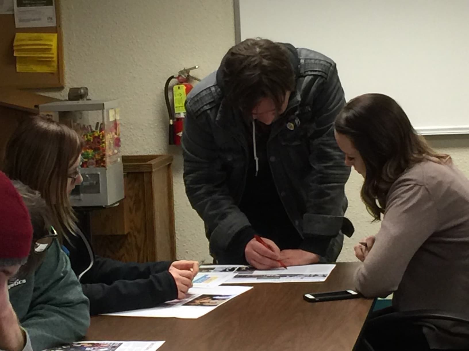 Brett Williamson worked as a feature reporter for Bismarck State College’s student newspaper, The Mystician. In this 2016 photo, he edits an article with Katie Winbauer, the former editor-in-chief.