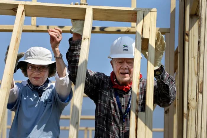 Former President Jimmy Carter, right, and former first lady Rosalynn Carter help build a Habitat for Humanity house in Violet, Louisiana, on May 21, 2007. The pair were working on the 1,000th Habitat for Humanity house in the Gulf Coast region since hurricanes Katrina and Rita. 