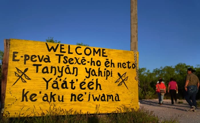 A welcome sign written in several different Native American languages at the entrance to the Indigenous Peyote Conservation Initiative homesite, led by several leaders within the Native American Church, in Hebbronville, Texas, Sunday, March 24, 2024.