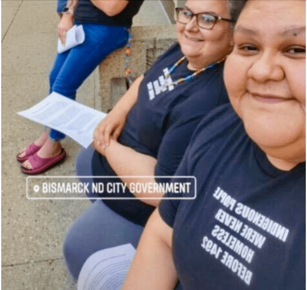 Valerie Siqueiros was one of 30 people who testified at a Bismarck City Council meeting opposing an ordinance banning encampments of the unhoused in October 2024. Pictured, she and fellow members of the Tenant Rights Association wear T-shirts with the slogan: “ Indigenous people were never homeless before 1492.”