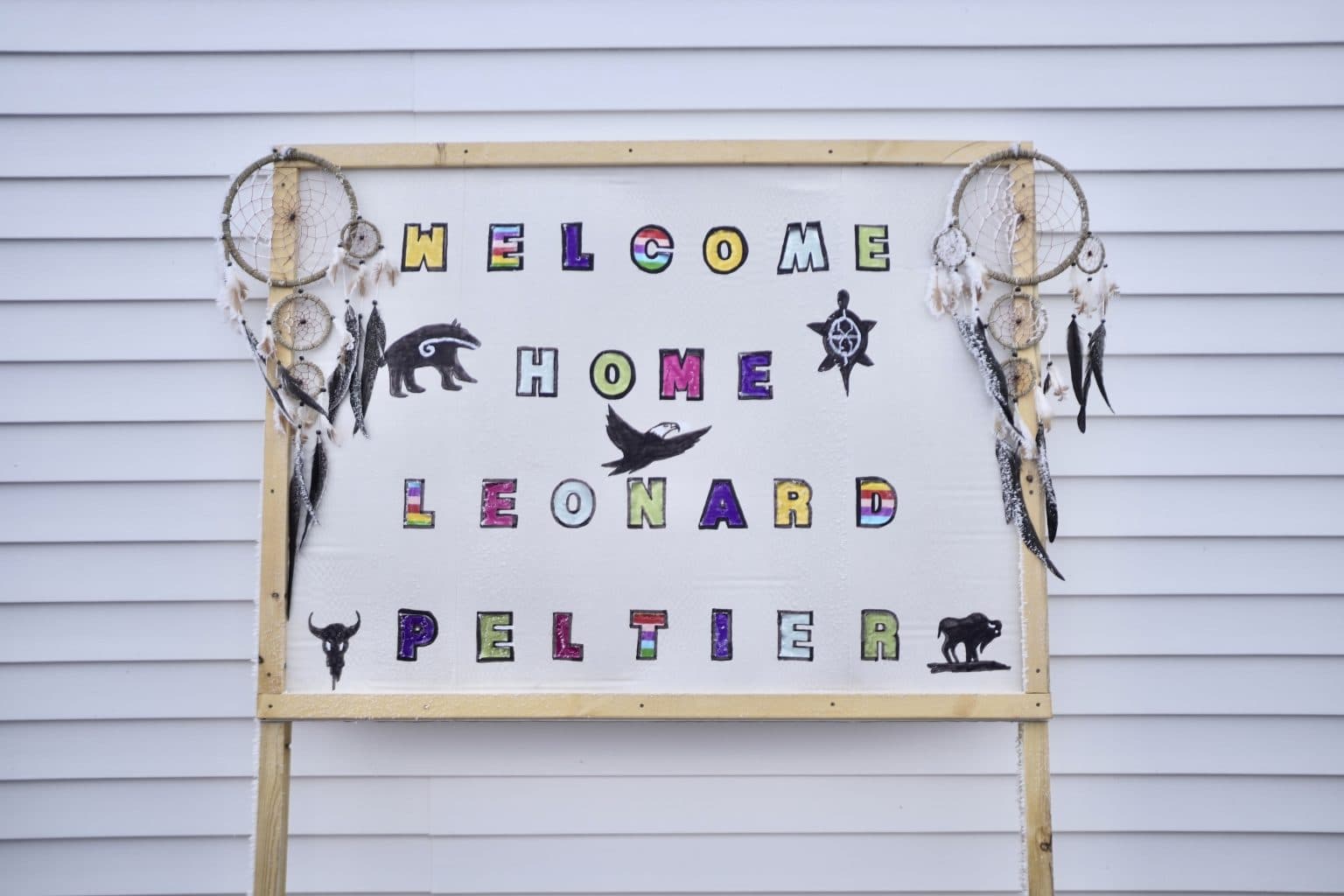 A "Welcome Home" sign is displayed for Leonard Peltier in Belcourt, N.D, on Tuesday, Feb. 25, 2025. 