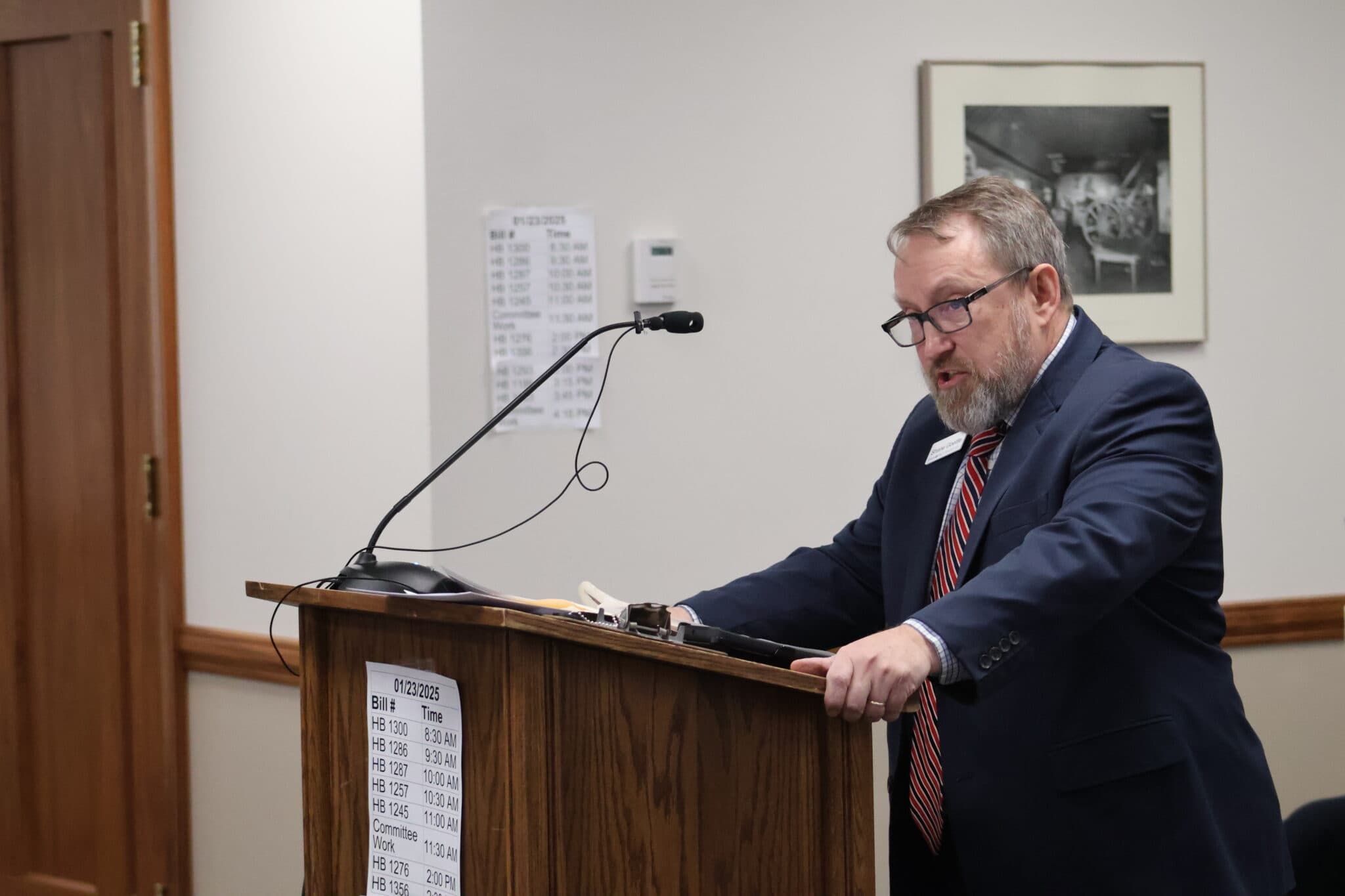 Shane Goettle, a lobbyist for Brighter Future Alliance, speaks in opposition to a bill that would require reporting on the true source of funds backing political campaigns in North Dakota on Jan. 23, 2025. He called the proposal unconstitutional and impractical.