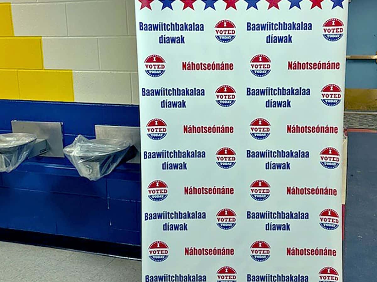 Bilingual sign for voters on the Crow Indian Reservation.