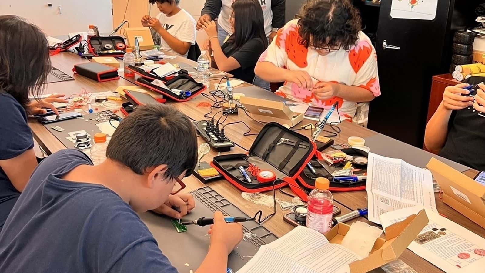 ASPIRE students work on soldering circuit boards the week of July 24-28 at United Tribes Technical College in Bismarck. Photo Credit: Alexa Azure