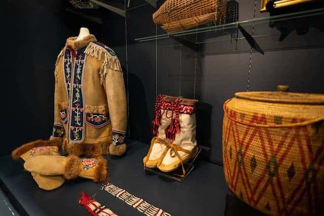 Athabascan objects, including a chief's coat from the Tanacross area, are displayed at the Alaska Native Heritage Center on Friday, April 22, 2022. The objects are some of 1,744 items that were donated to the center by Wells Fargo. (Loren Holmes / ADN)
Anchorage Daily News