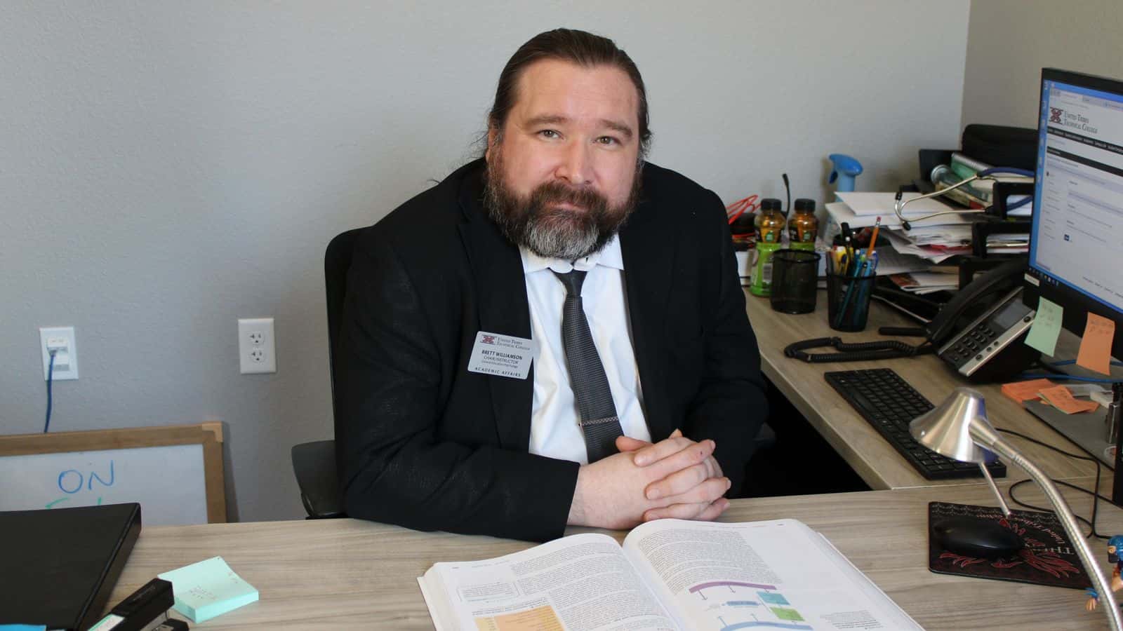 Brett Williamson, a research psychologist and instructor at United Tribes Technical College, will begin his role as dean of instruction on Jan. 6. He joined the faculty in 2019 and has since been committed to supporting students. (Photo credit Adrianna Adame)