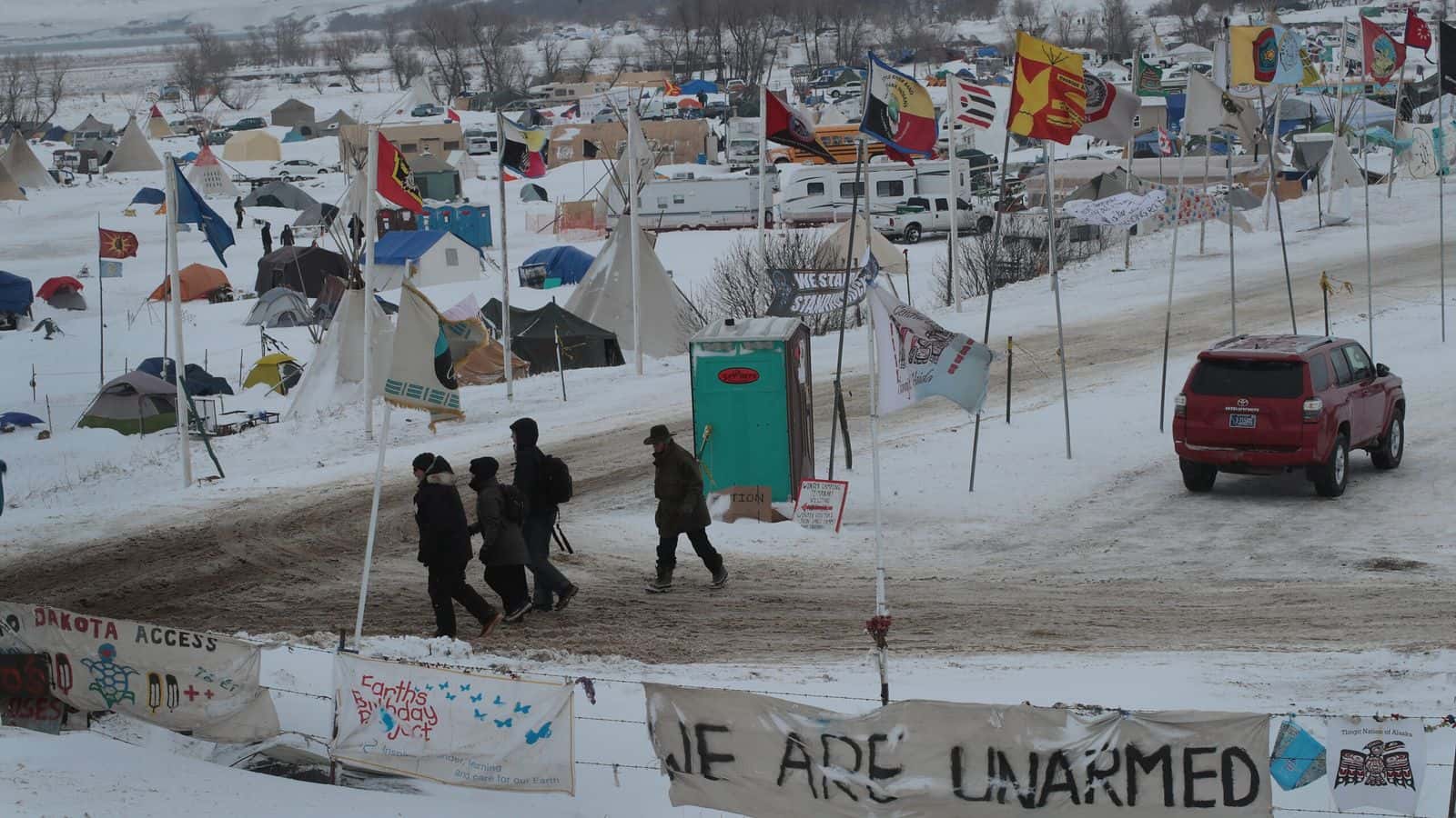 CANNON BALL, ND - NOVEMBER 30: Snow covers Oceti Sakowin Camp near the Standing Rock Sioux Reservation on November 30, 2016 outside Cannon Ball, North Dakota. Native Americans and activists from around the country have been gathering at the camp for several months trying to halt the construction of the Dakota Access Pipeline. The proposed 1,172 mile long pipeline would transport oil from the North Dakota Bakken region through South Dakota, Iowa and into Illinois. (Photo by Scott Olson/Getty Images)