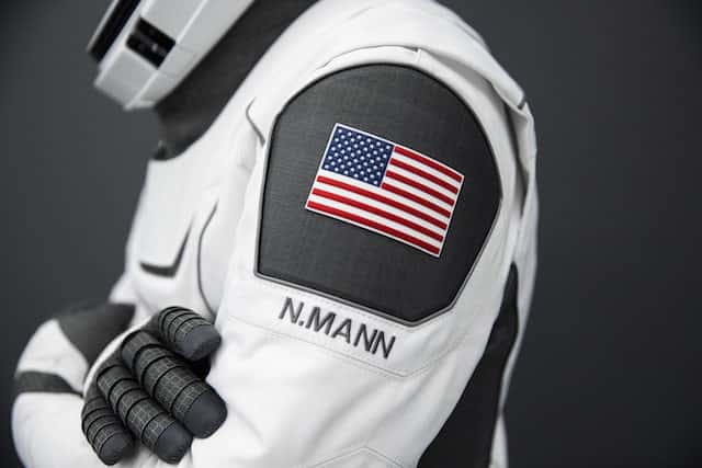 A SpaceX launch and entry suit bears an American flag, and the name of NASA Astronaut Nicole Mann, who will serve as the commander of NASA's SpaceX Crew-5 mission to the International Space Station. (Photo courtesy of NASA)