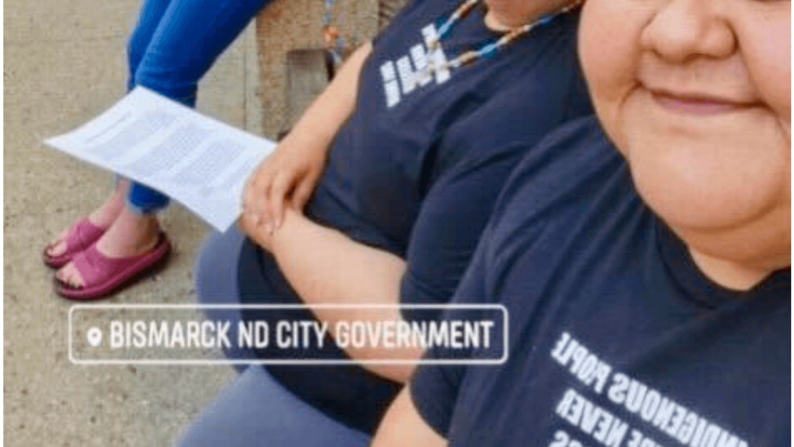 Valerie Siqueiros was one of 30 people who testified at a Bismarck City Council meeting opposing an ordinance banning encampments of the unhoused in October 2024. Pictured, she and fellow members of the Tenant Rights Association wear T-shirts with the slogan: “ Indigenous people were never homeless before 1492.”