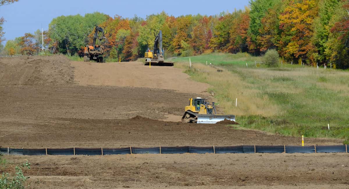 Construction workers grade over the location of the buried Enbridge Line 3/Line 93 pipeline in Clearwater County, Minnesota, on Oct. 5, 2021. (Photo by Mary Annette Pember/Indian Country Today)