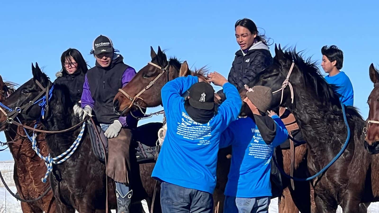 On a stop between Wounded Knee, S.D. and Pine Ridge, S.D, Oomaka Tokatakiya, Future Generations Riders make the final leg of a 300-mile journey on Dec. 29. The ride commemorates the Wounded Knee Massacre of Dec. 29, 1890. Photo Credit/Jodi Rave Spotted Bear