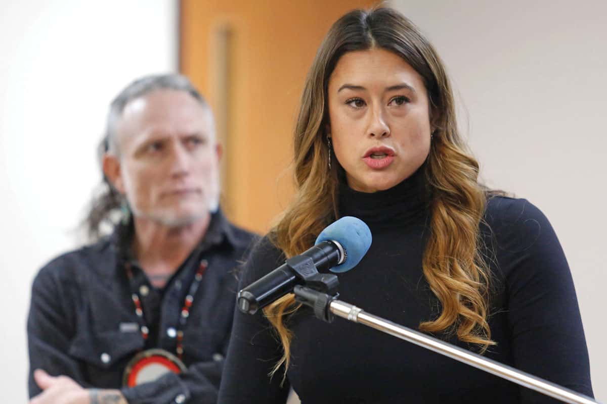 Editorial Board members MIa Prickett, front and Monty Herron make a presentation during the Tribal Council meeting in the Community Center on Sunday, Dec.2.