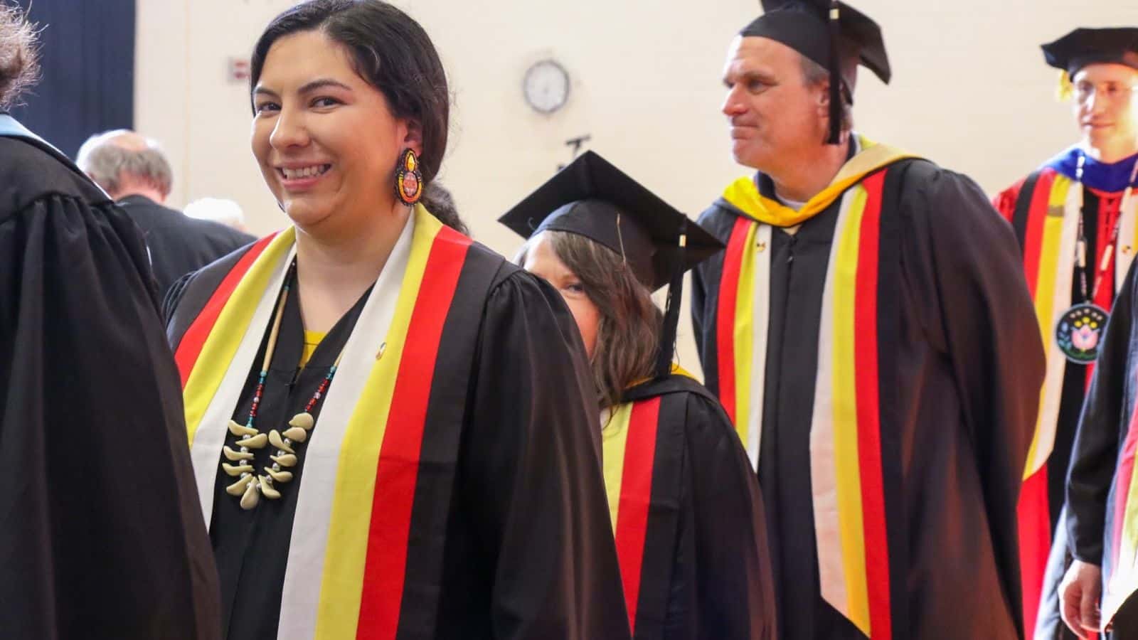 For the last six years Michelle Goose has been an Ojibwe language instructor at Fond du Lac Tribal and Community College. Here she is pictured during a commencement ceremony in 2023. (Photo by Taylor Warnes)