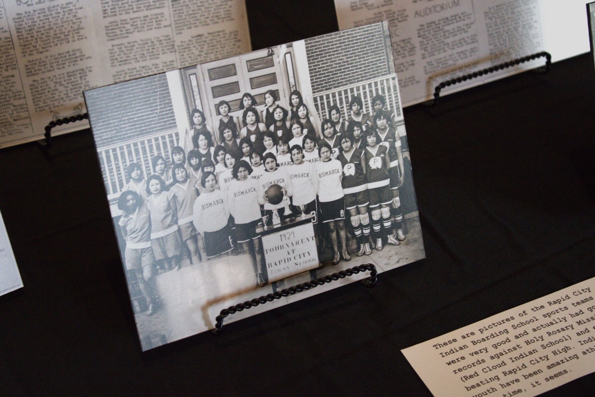 A photo of the Rapid City Indian School's women's basket ball team of 1929 is featured in the Remembering the Children Exhibit in downtown Rapid City. (Photo by Amelia Schafer, ICT/Rapid City Journal)