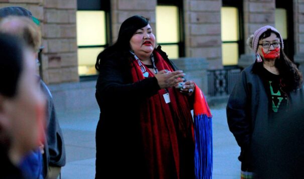 Candi Brings Plenty prays outside of the South Dakota State Capital in Pierre in 2020. (AP Photo/Stephen Groves, File)