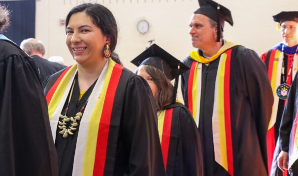 For the last six years Michelle Goose has been an Ojibwe language instructor at Fond du Lac Tribal and Community College. Here she is pictured during a commencement ceremony in 2023. (Photo by Taylor Warnes)