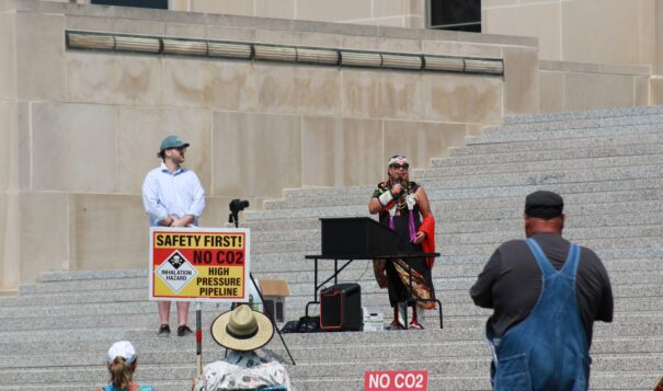 Wilkie addresses North Dakotans gathered to oppose Summit Carbon Solutions proposed pipeline in July (Photo credit: Grace Fiori).